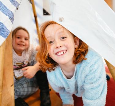 Children in a den